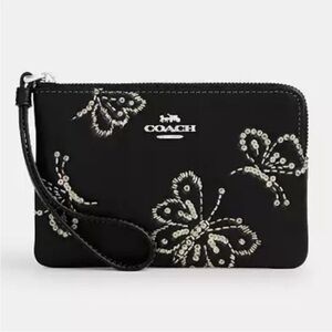 Coach Black and White Butterfly Wristlet